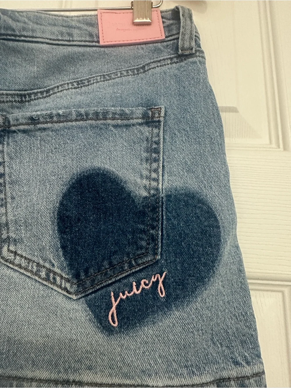 Juicy Couture Y2K blue denim Jean mini skirt with heart detail, size 3